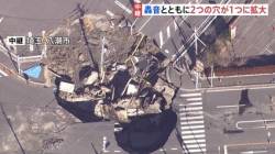 【画像】道路陥没のトラック運転手、様子がおかしい